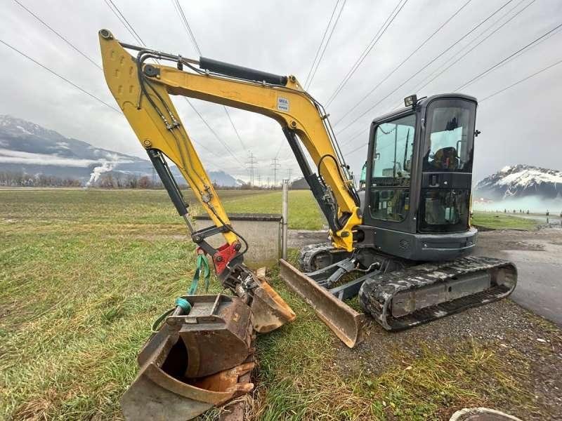 New-Holland-E50B-SR-France_591_8117535699429_2025-04-02_10-52-19.jpg New holland E50B SR avec Accessoires – Image 1