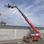 Manitou MRT 2540 M – Télescopique rotatif avec panier & télécommande