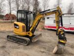 Caterpillar 302.7D avec accessoire + Remorque – Image 10